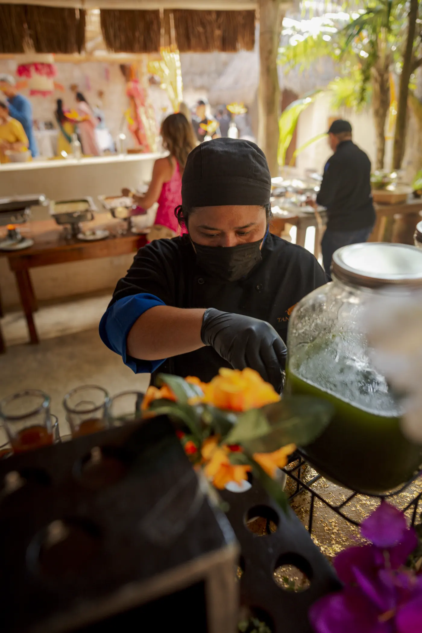 Chef preparing Pani Puri shots