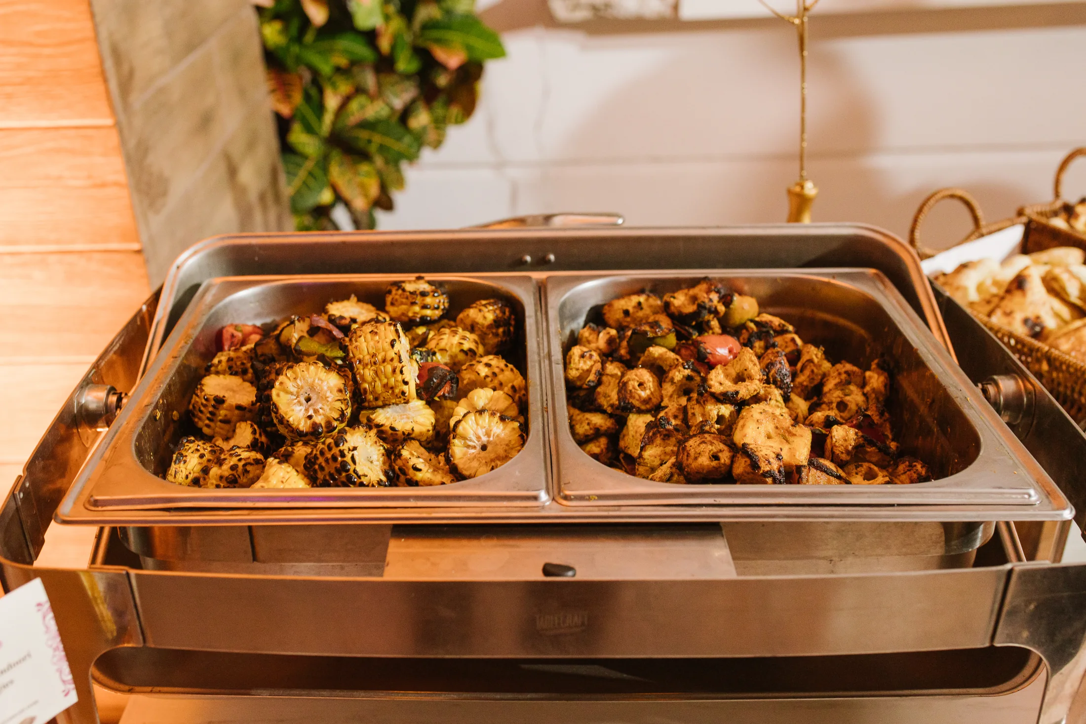 Indian buffet with grilled corn and vegetables