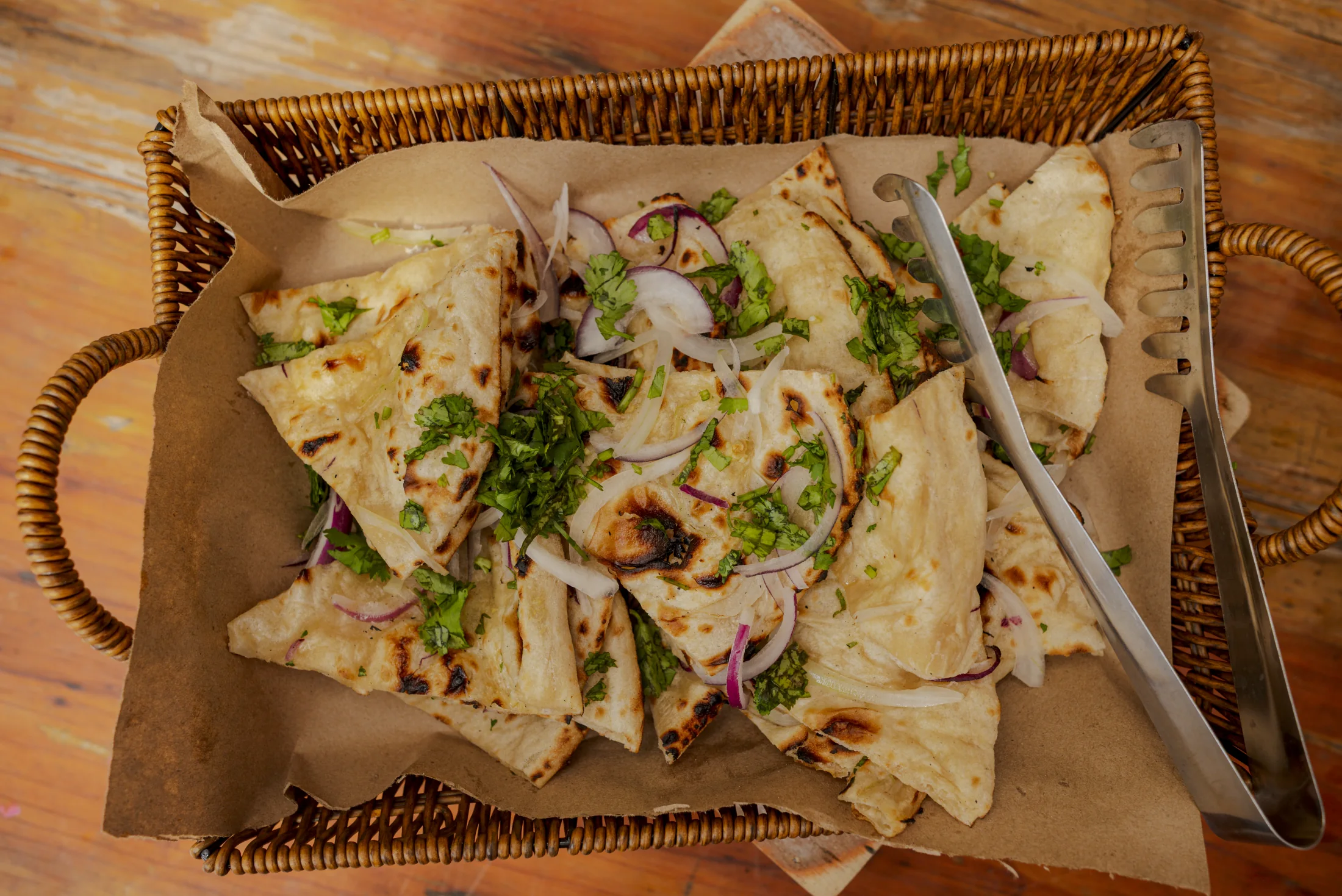 Assorted freshly baked naan flavors