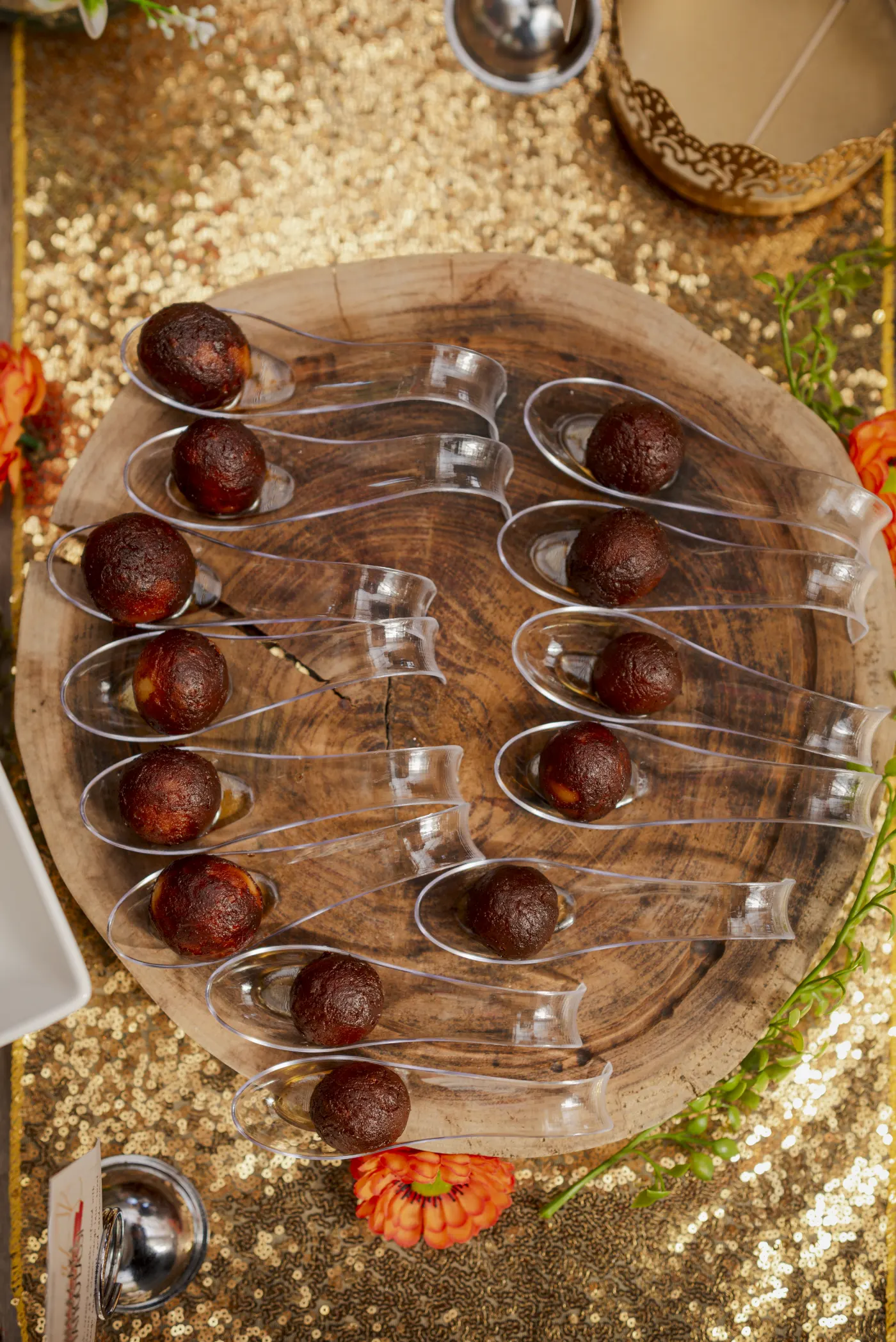 Gulab Jamun served in tasting spoons