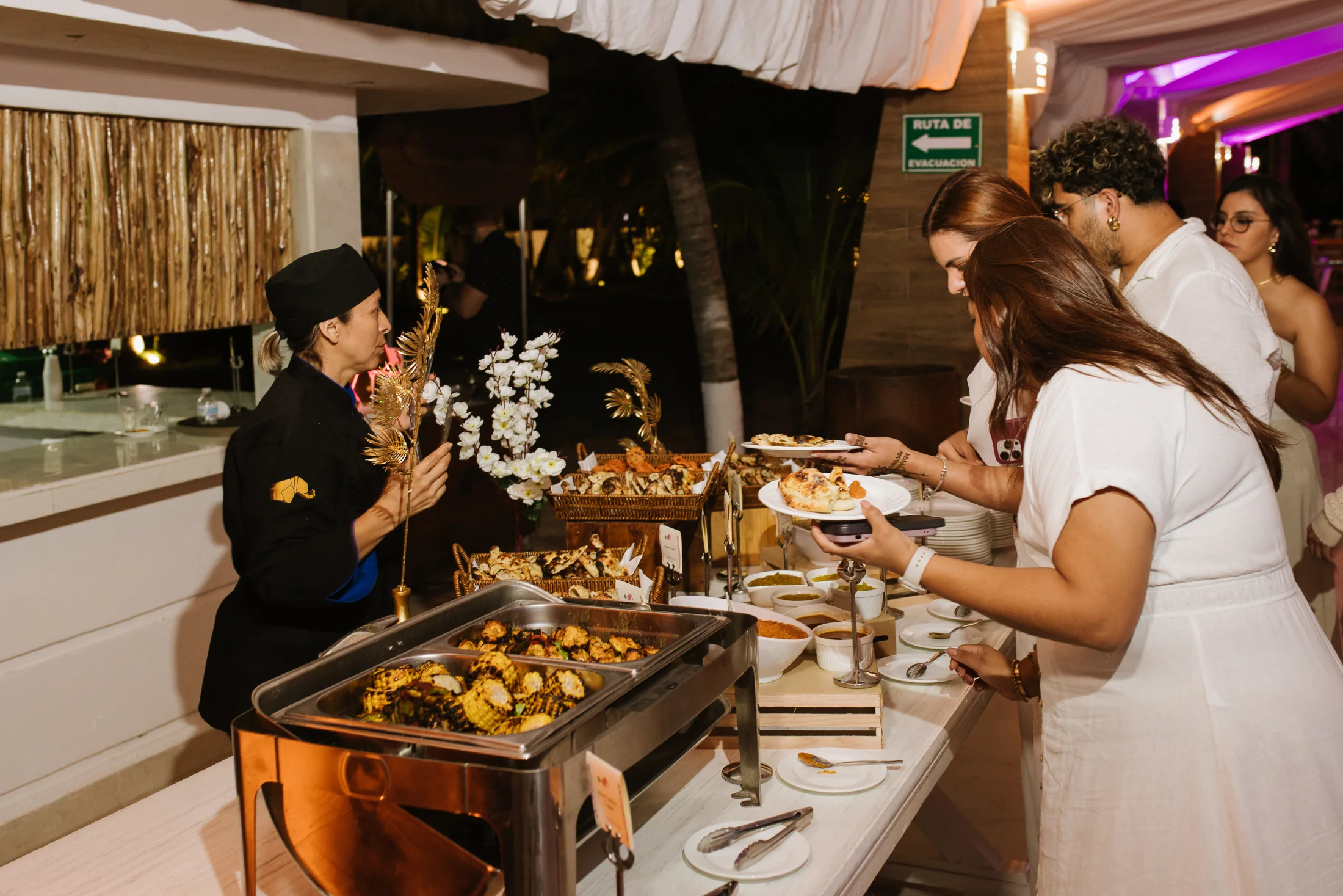 Guests enjoying buffet service during a celebration