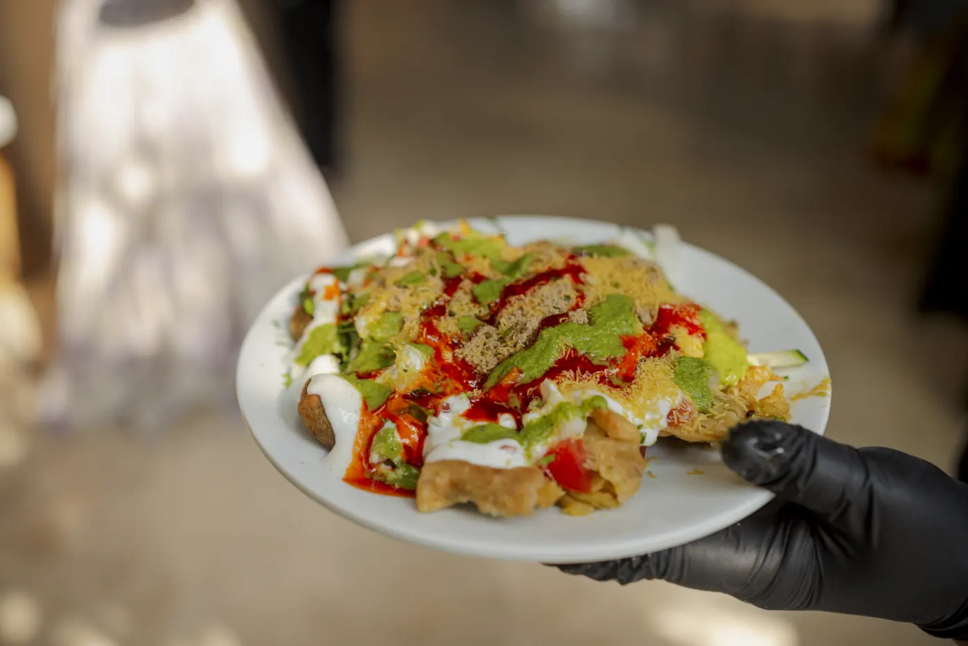 A colorful plate of Indian chaat